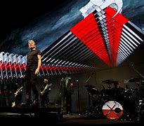 Image result for Roger Waters Us and Them Tour Beach Scene