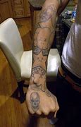 Image result for Chris Brown Kaws Tattoo