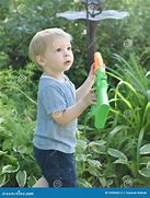 Image result for Little Boy with Toy Gun