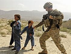Image result for Soldier Holding Child