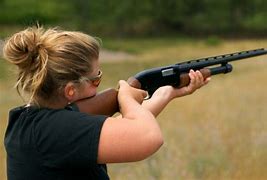 Image result for Woman Shooting Gun