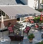 Image result for Sunbrella Outdoor Retractable Awnings