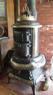 Image result for Cast Iron Adaptors for Old Parlor Stoves