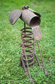 Image result for Recycled Garden Junk Art