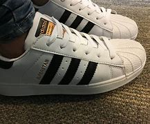 Image result for All-Black Adidas Running Shoes
