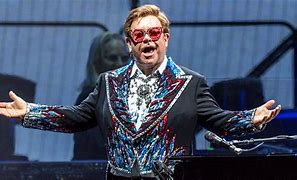 Image result for Elton John Broke Down On Stage