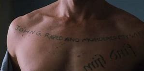 Image result for Guy Pearce Memento Tattoos