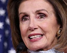 Image result for Nancy Pelosi Green Dress with Bullets