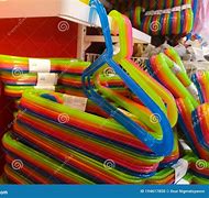 Image result for Multi Colored Plastic Hangers for Clothes