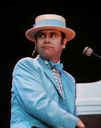 Image result for Elton John 80s Clear Picture in Yellow