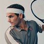 Image result for Roger Federer UNIQLO RF