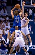 Image result for Nick Collison Chasing Basketball Out of Bounds