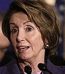 Image result for Nancy Pelosi with a Santa Hats