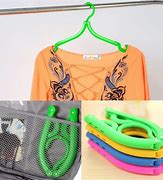 Image result for Folding Wall Mounted Clothes Hanger