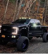 Image result for Jacked Up Ford Trucks