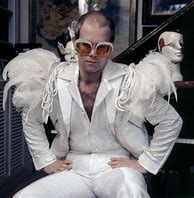 Image result for Elton John Outfits Blue