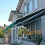 Image result for Retractable Patio Awnings for Decks