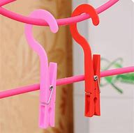 Image result for Plastic Clothes Pegs with Hanging Hook