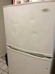 Image result for Refrigerator Dented Hardwood Floor
