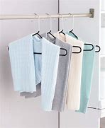 Image result for Sweater On a Cloth Hanger