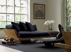 zen living room ideas with black sofa for small space