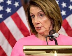 Image result for Nancy Pelosi Holding a Sign