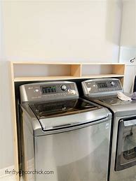 Image result for White Hidden Front Load Washer and Dryer Room