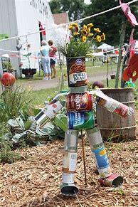 Image result for Tin Can Yard Art