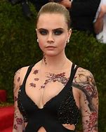 Image result for Cara Delevingne Tattoos and Piercings
