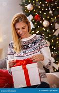 Image result for Woman Opening Christmas Presents