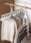Image result for fold clothing hangers racks