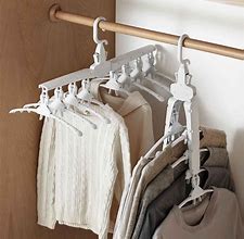Image result for Hangers That Bend for Multiple Clothes