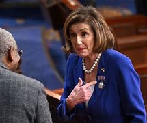 Image result for Nancy Pelosi Lapel Pin to Signal Power