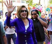 Image result for Nancy Pelosi in Her Fuchsia Pants Suit