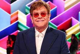 Image result for Elton John Eating