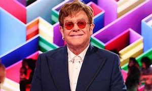 Image result for Elton John Pink Suit