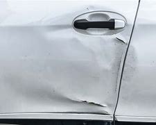 Image result for How to Pull Dents From Car Door