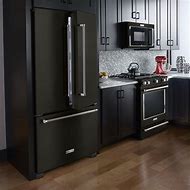 Image result for Black Stainless Steel Appliances with Oak Cabinets