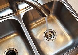 Image result for How to Unclog a Kitchen Sink Garbage Disposal