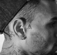 Image result for Chris Brown Triangle Tattoo