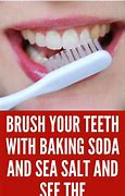 Image result for Brushing Teeth with Baking Soda