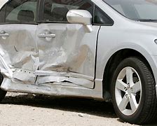 Image result for Dented Silver Car