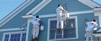 Image result for men painting uotside of a house