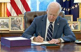 Image result for Biden Signing with Left Hand