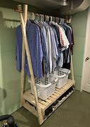 Image result for How to Hang Pants On Wooden Hangers