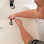 Image result for Cleaning Shower Drain