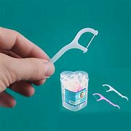Image result for Flossing Teeth Dental Floss