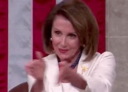 Image result for Picture of Nancy Pelosi Applauding Trump