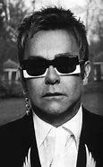 Image result for Elton John Smirk