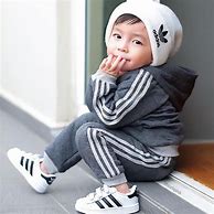 Image result for Baby Blue Adidas SST Tracksuit